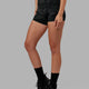 Woman wearing Elixir X-Short Tight - Black Camo