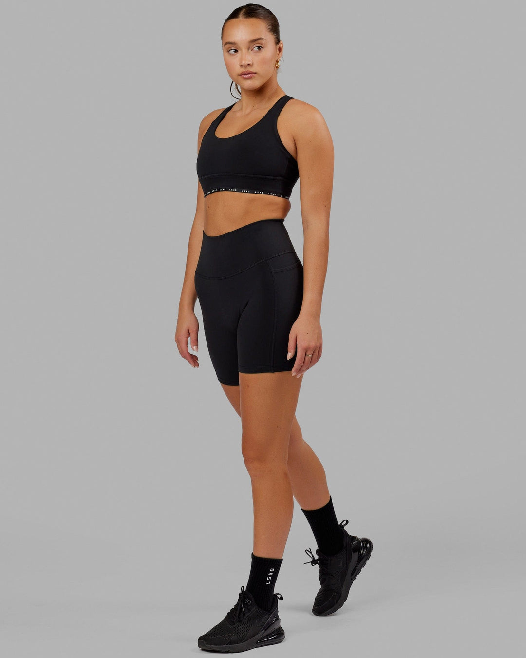 Woman wearing Fusion Mid Short Tight - Black