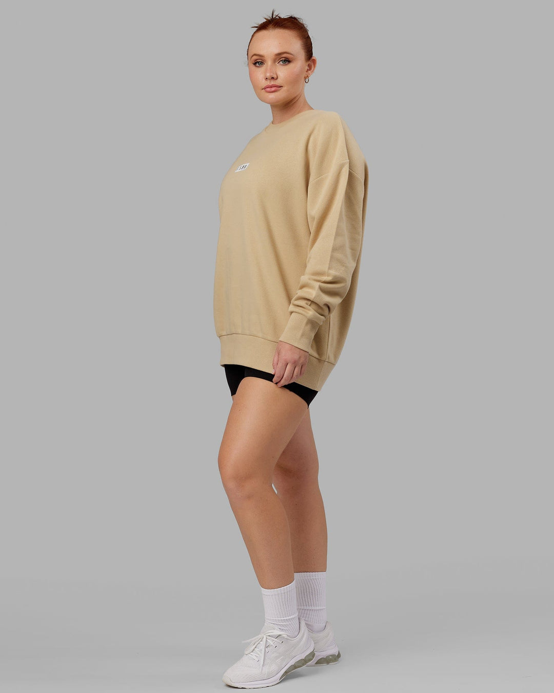 Woman wearing Unisex Cornerstone Sweater Oversize - Pale Khaki